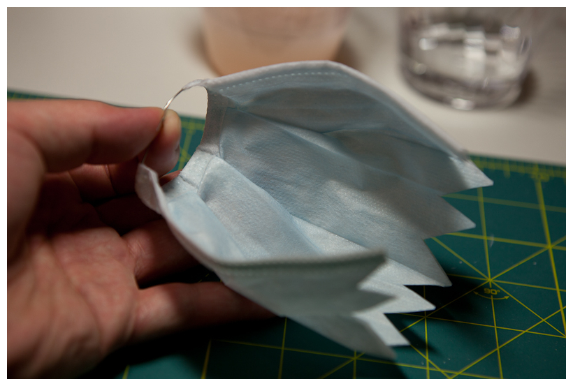 Cloak trimmed in zigzag pattern with wire edge