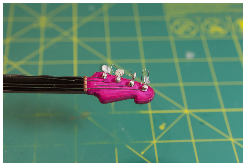 Guitar with steel wire strings added